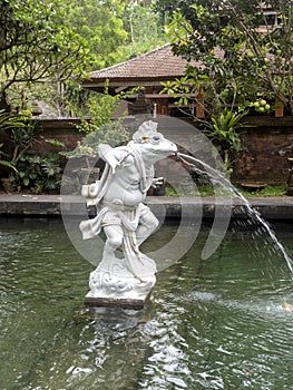The Pura Tirta Empul, Bali Indonesia, with holy water ponds, goldfish and water spouts