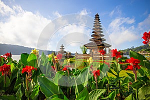 Pura Ulun Danu Bratan temple in Bali island. Beautiful balinese temple. Balinese landmark. Blue sky with white clouds. Foreground