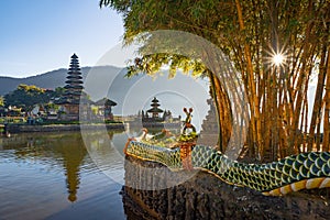 Pura Ulun Danu Bratan Temple at sunrise, a Hindu temple with mountain, lake, in Bali island, Indonesia. Natural landscape