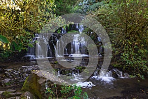 Purakaunui Falls, New Zealand. Slow shutter speed smoothes fall