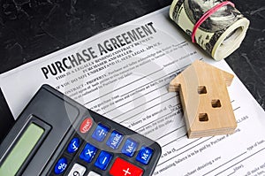 Purchase agreement. The concept of buying a home, real estate, apartment. Services realtor and real estate agent. Sale / sold hous
