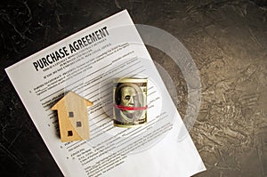 Purchase agreement. The concept of buying a home, real estate, apartment. Services realtor and real estate agent. Sale / sold hous