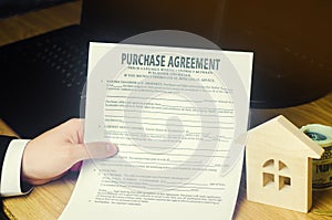 Purchase agreement. The concept of buying a home, real estate, apartment. Services realtor and real estate agent. Sale / sold hous