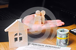 Purchase agreement. The concept of buying a home, real estate, apartment. Services realtor and real estate agent. Sale / sold hous