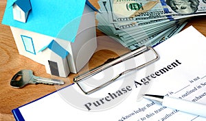 Purchase agreement document with home model.