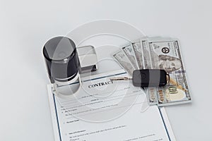 Purchase contract for a car with money, stamps and car keys