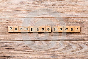 Purchase power word written on wood block. Purchase power text on wooden table for your desing, concept