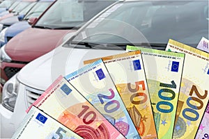 Purchase price for a car - Euro notes with cars in the background