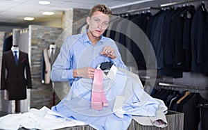 purchaser choosing tie and shirt