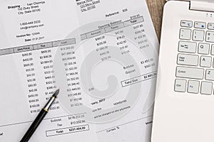 Purchasing concept with order document and laptop