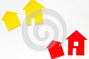 Purchasing house with paper figure on work desk white background top view mock up