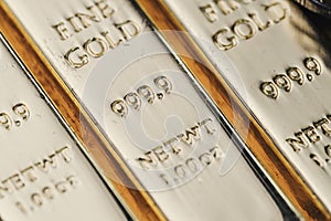 Pure 999.9 shiny fine gold bullions ingot bars, closed up macro