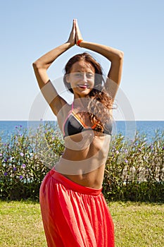 Pure beauty. Summer vacation and travel. Perfect body of belly dancer. Suntan. Woman dancing with body. woman with fit