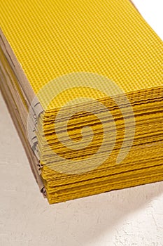 Pure beeswax comb panels close-up high angle view