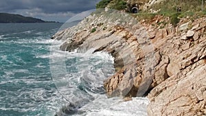 Pure Blue Waters Sea, Coastal Waves Breaking And Splashing Adventure On Sea Coast Surf Rocks. Footage. Summer