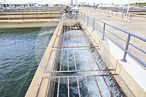 Pure and clean water flowing in waterworks industry estate photo