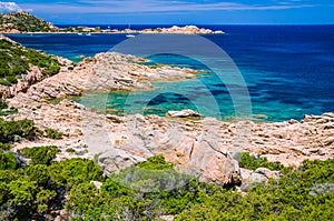 Pure clear azure sea water and amazing rocks on coast of Maddalena island, Sardinia, Italy