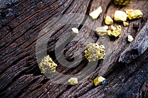 Pure gold ore on wood