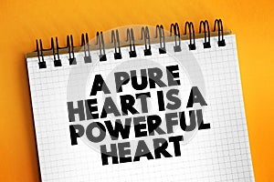 A Pure Heart is a Powerful Heart text on notepad, concept background