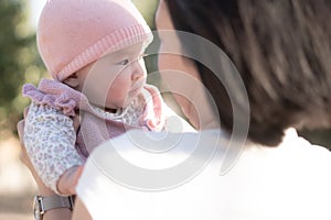 pure joy as a young Asian Korean mother lovingly plays with her little baby girl, creating a lasting affection happiness bond -