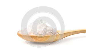 Pure natural sea salt in wooden spoon