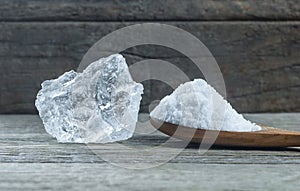 Pure natural white crystal bath or rock salt with food or sea salt
