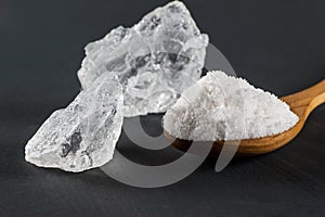 Pure natural white crystal bath or rock salt with food or sea salt