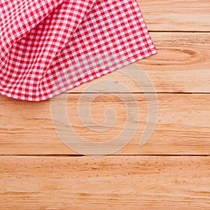 Pure notebook for recording menu, recipe on red checkered tablecloth tartan.