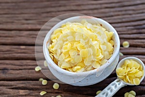 Pure organic yellow beeswax pellets for natural beauty and D.I.Y. project