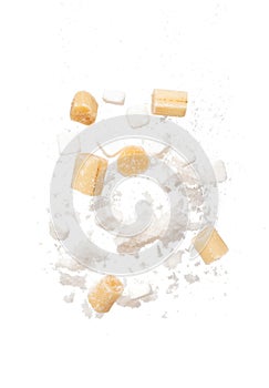 Pure Refined Sugar cane cube flying explosion, yellow chop sugarcane abstract cloud fly. Pure refined sugar sugarcane cut cubes