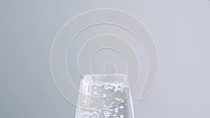 Pure Water Poured Into Glass close up. Super slow motion. Quenching thirst concept