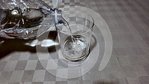 Pure Water Poured Into Glass Closeup slow motion
