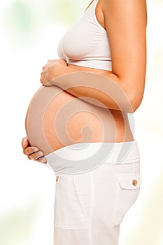 Pure white pregnant torso abdomen isolated