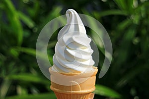 Pure White Vanilla Soft Serve Ice Cream Cone photo