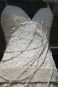 Pure white wedding gown with pearls