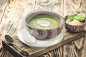 Puree cream soup of green leaf lettuce, spinach and cheese