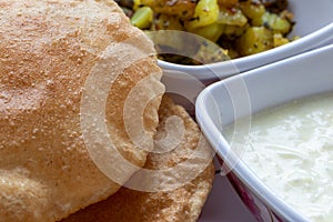 Puri Bhaji, Masala Aloo Sabzi fry served with fried puri