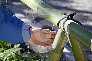 The purification fountain `Chozuya` in the Japanese shrine.