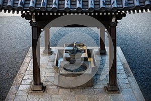 Purification fountain at shrine in Kyoto, Japan