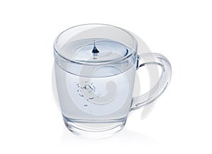 Purified fresh drink water with drop in a glass