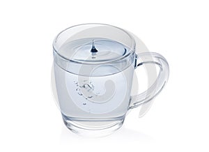 Purified fresh drink water with drop in a glass photo
