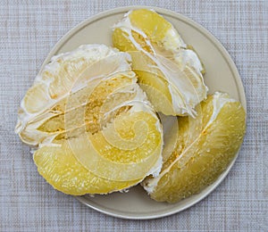 Purified pomelo lying in a plate