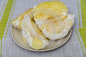 Purified pomelo lying in a plate