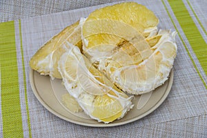 Purified pomelo lying in a plate