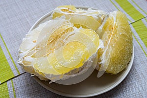 Purified pomelo lying in a plate