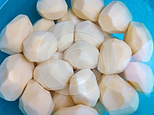 Purified raw whole potatoes in a bowl