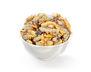 Purified walnuts in a white ceramic bowl