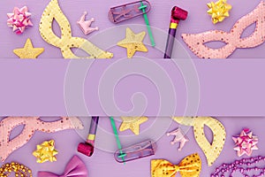 Purim celebration concept & x28;jewish carnival holiday& x29; over pink wooden background. Top view.