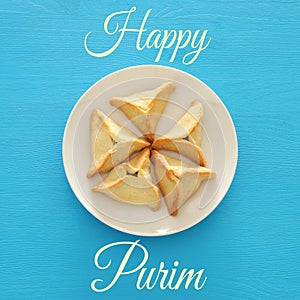 Purim celebration concept & x28;jewish carnival holiday& x29;. Traditional hamantaschen cookies. Top view.