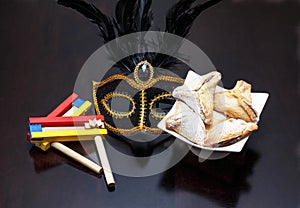 Purim holiday cookies, Colorful noisemaker, and Purim Mask